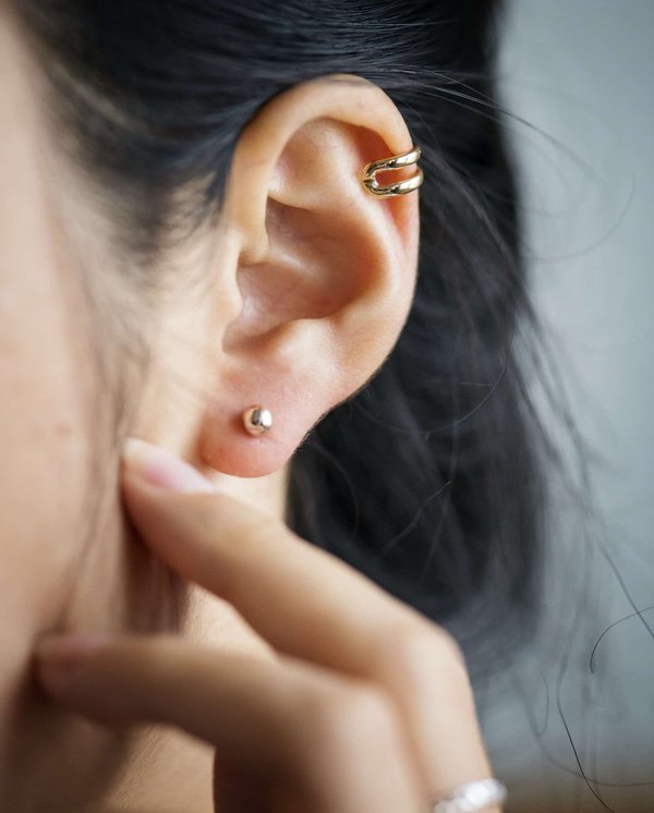 Découvrir les œuvres et les performances du piercing à l'oreille
